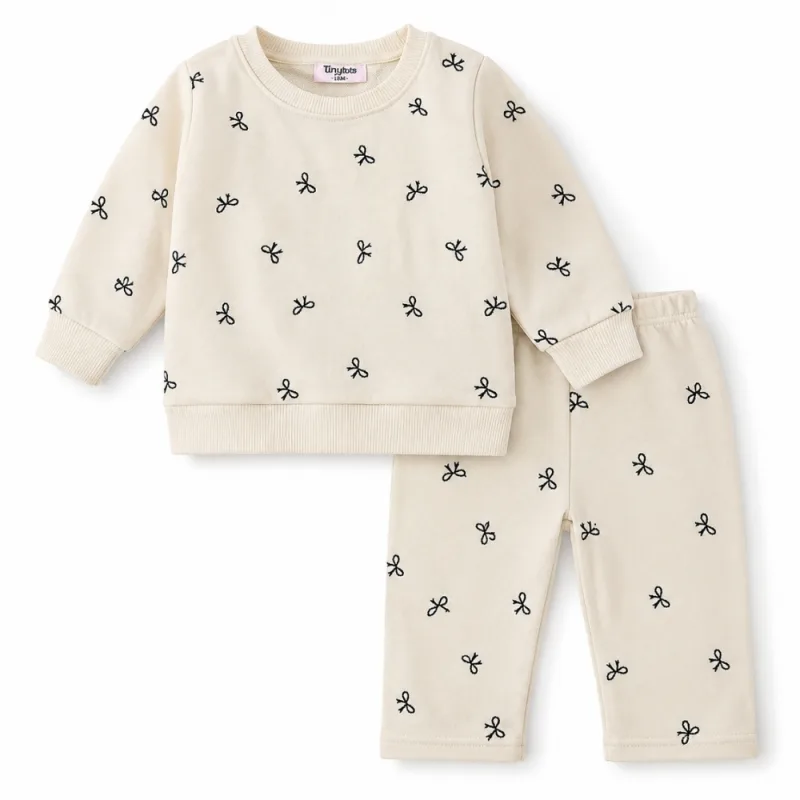 Conjunto para Niña Tiny Tots Suéter y Pantalón con Lazos Crema